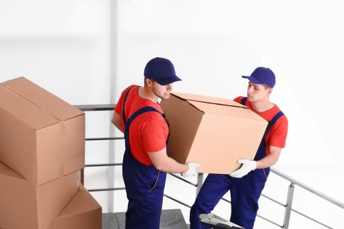 Furniture being picked up by removal team