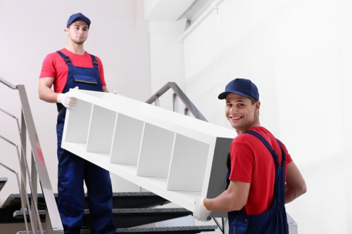 Illustration of movers evaluating a removal quote