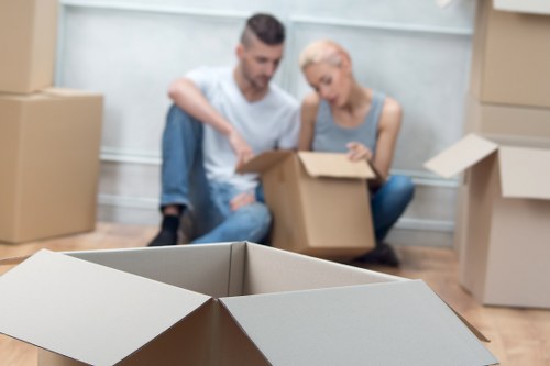 Removalists handling large furniture