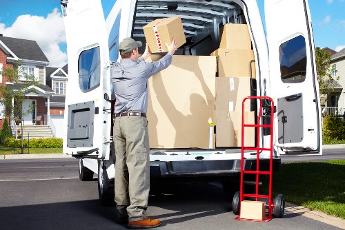 Office movers handling furniture with care