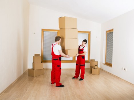 Happy family moving into their new home